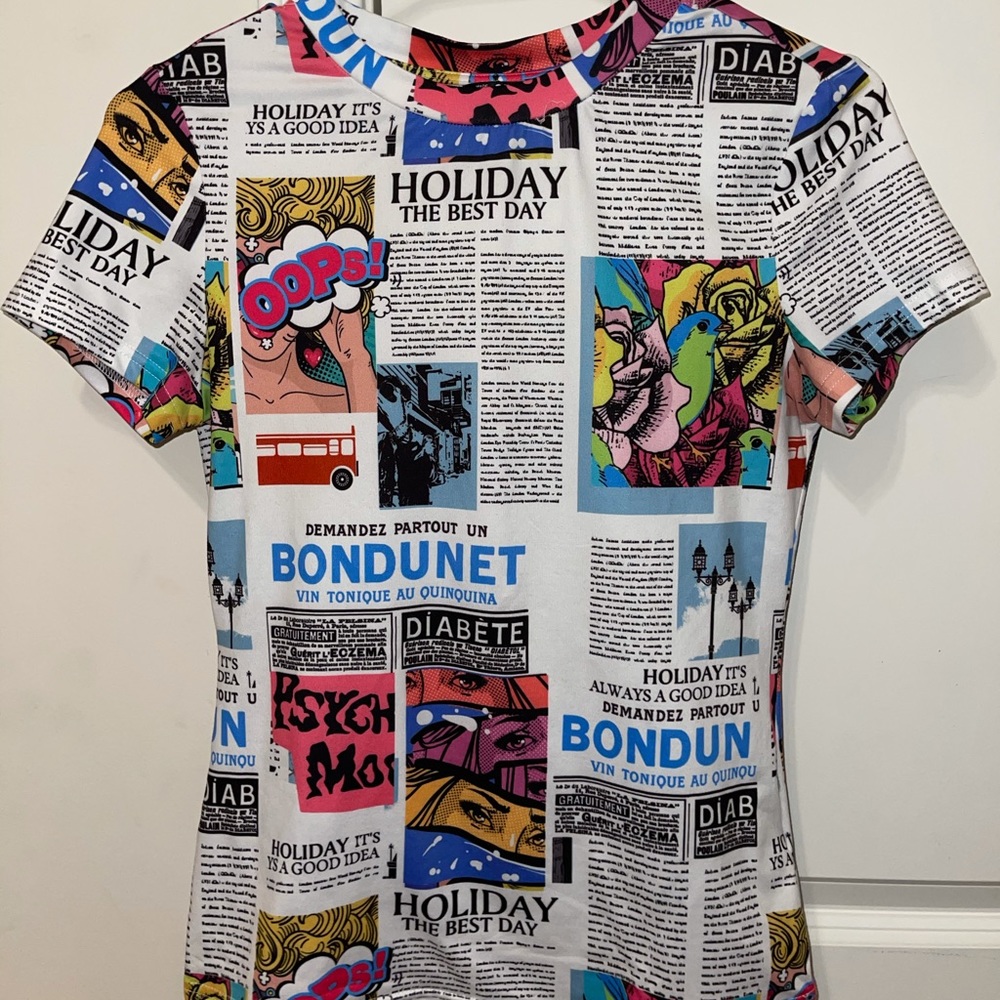 Newspaper graphic tee.